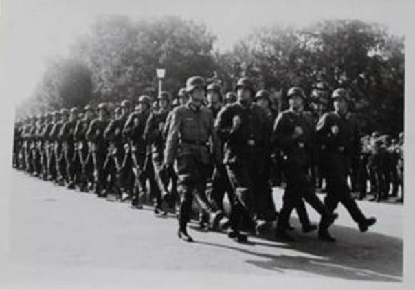 Nachrichten Abt. 216 (signal detachment) marching past in front of their Commander - Bagnoles 1941.......