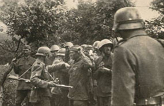 Russians POWs taken after hard resistance.