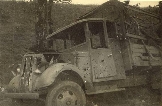 A hail of bullets unleashed at this truck - France 1940.
