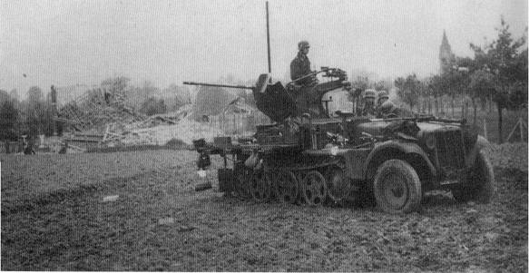 A German flak of 37 mm mounted on a Sd Kfz 10 near Veldwezelt.