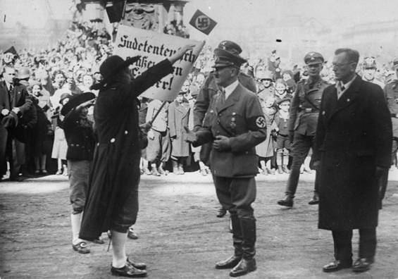 Ceremony at the Heroes 'Square: During a ceremony at the Heroes' Square in Vienna 15 March 1938, Adolf Hitler greeting a Sudeten German delegation. To his right, Dr. Arthur Seyss-Inquart.