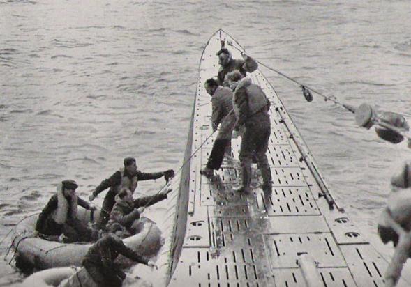 A German submersible rescuing pilots of a British bomber North Atlantic waters .......................