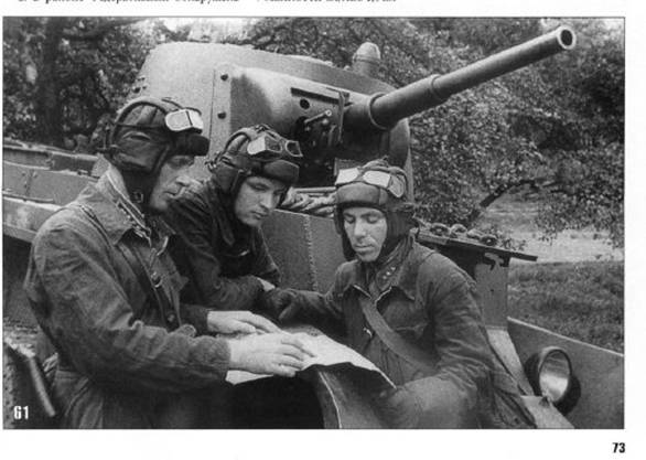The crew of a BT-7 focuses on the map before setting off ......................<br /> The first on the left was Colonel Petr Semenovich Fotchenkov , Commander of the 8th TD?<br /> http://nemirov41.forum24.ru/?1-4-0-00000011-000-0-0-1343724564