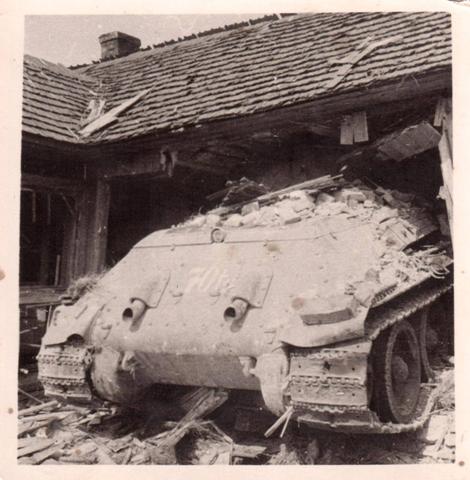 Another view of the T-34 embedded in a house within Nemiroff ............................<br />https://ta-in.facebook.com/pancelvadasz1/photos/a.756607707687720.1073741828.756591934355964/763720780309746/?type=1&amp;permPage=1