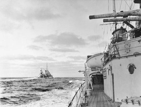 The cruiser H.M.S. ACHILLES seen from H.M.S. AJAX at the Battle of the River Plate.............................<br />https://es.wikipedia.org/wiki/Batalla_del_R%C3%ADo_de_la_Plata#/media/File:HMS_Achilles_(70).jpg