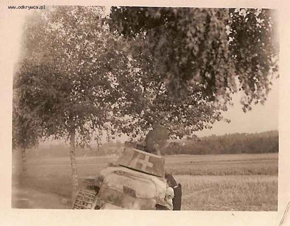 Rear view of a Pz Kw 35 (t) stopped by the side of a Polish road (apparently with some damage)................................