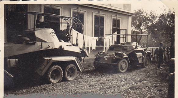 Hanging the laundry; to the left a Funkwagen Sd Kfz 263 (6-rad) and to the right a Funkwagen Sd Kfz 223 - Třebovice 1938............................
