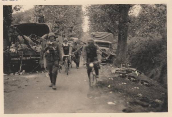A patrol of cyclists moving through the wreckage of an enemy column ...................................