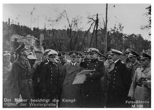 The Führer at the battlefield of Westerplatte, at his side the Kapitän zur See Gustav Kleikamp commander of Schleswig-Holstein .......................... ...