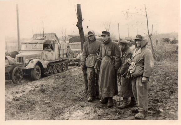 A German motorized column somewhere in the Russian front; in the middle a Sd Kfz 11/2 as a cargo vehicle...................................