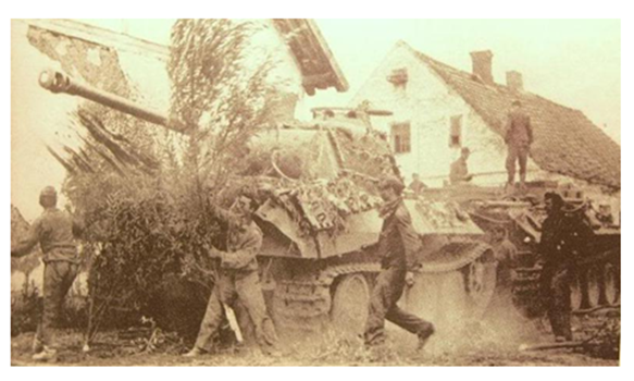Masking with branches a Pz Kw V &quot;Panther&quot; Ausf. A possibly in Courland......................................................