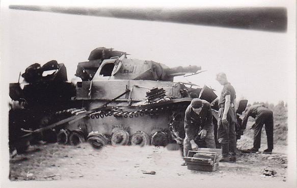 A Pz Kw IV Ausf. D/E being cannibalized at the front...............................