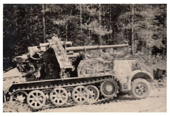 An 8.8 cm Flak 18 (Sfl) auf Zukraftwagen 12t (Sd.Kfz 8) operating in a wooded area at the beginning of Barbarossa ............................................