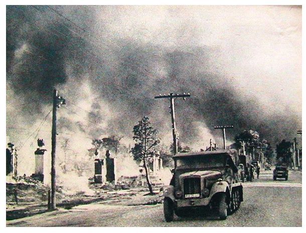 In the foreground a half-track on Proletarskaya Street (in June 1941, almost all buildings in the area were burned) ..............................