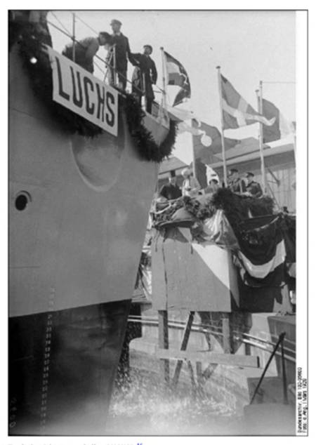 At the state shipyard in Wilhelmshaven! The breaking of the champagne bottle at the bow of the new German destroyer, March 1928