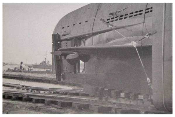 Interesting view (starboard) of the stern of a German submarine Type XXI still in the slipways of the shipyard F. Schichau GmbH (according to the source)..........................