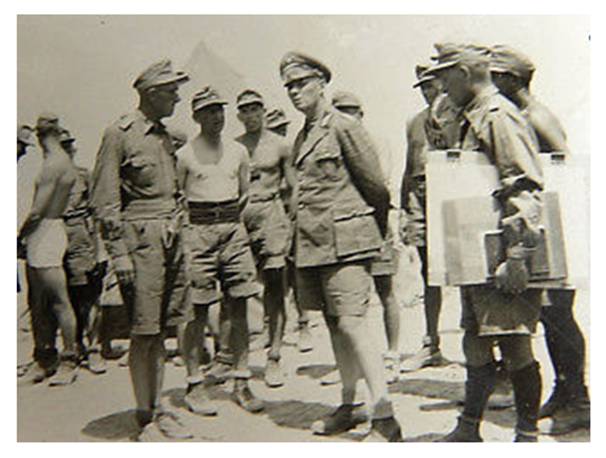 General Erwin Rommel during a visit to the front in the sector of Tobruk.........