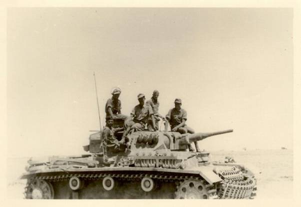 The crew of this Pz Kw III Ausf F? posing for the photo.................................