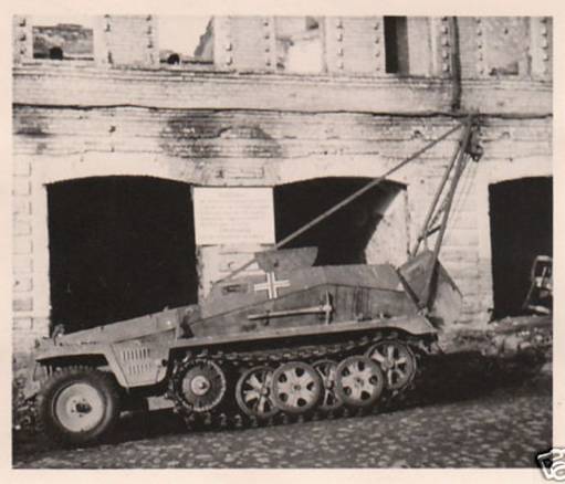 A leichter gepanzerter Beobachtungskraftwagen Sd. Kfz. 253, equipped with a crane...........................