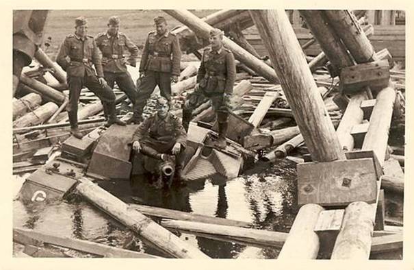 The Stug III Ausf. B &quot;Lützow&quot; on the destroyed bridge over the Beresina.....................