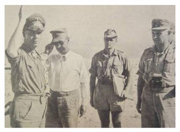 General Rommel with the recipient of the Knight's Cross, Hptm. Bach (in white shirt), the heroic defender of Halfaya Pass..........