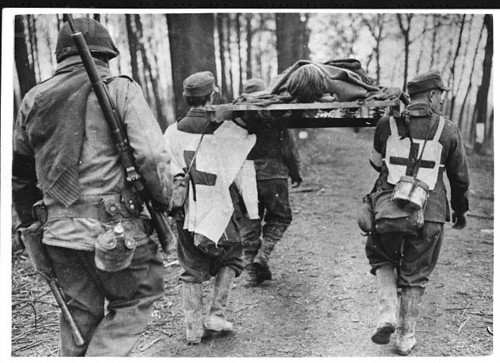 YOU CAN SEE IN THE IMAGE THAT GERMAN MEDICS ARE WORKING FOR THE AMERICANS