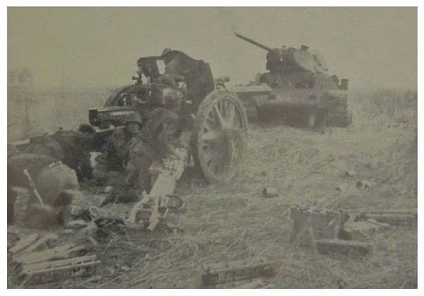 Just a meter in front of the howitzer, the T-34 received the decisive blow...........