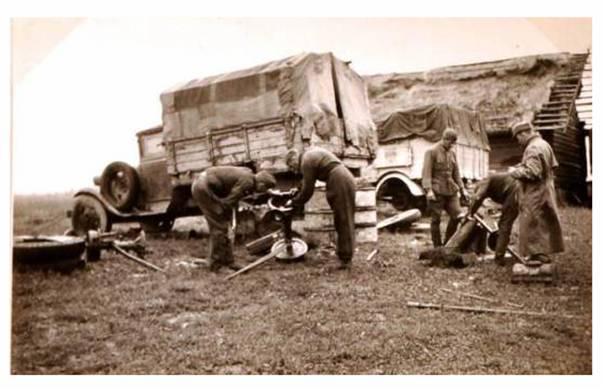 Dealing with the differential; any idea about the type of truck in the foreground.............