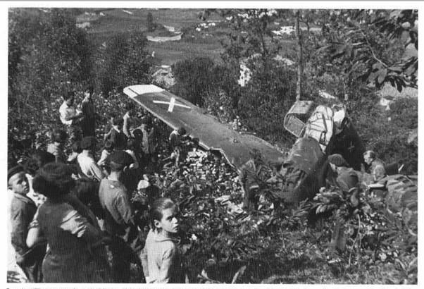 Fighter pilots fare no better in Llanes. Lt. Walter Adolph lands too late and rolls off the edge of the field onto the steep slope behind...................