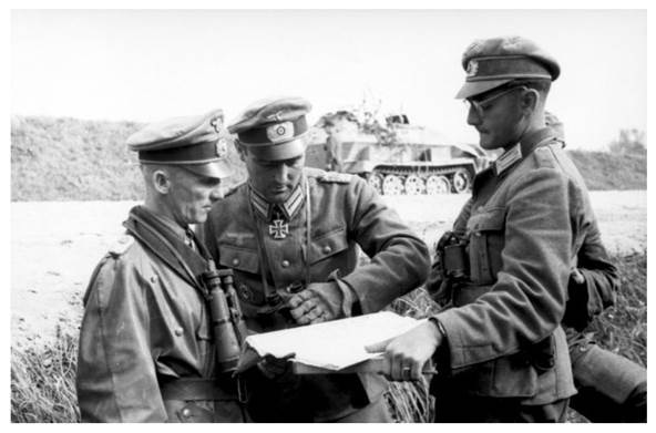Hasso von Manteuffel (left), Major Hugo Schimmel (center) consulting with officers of the Großdeutschland Division (Vilkaviskis, Lithuania, August 1944).....................