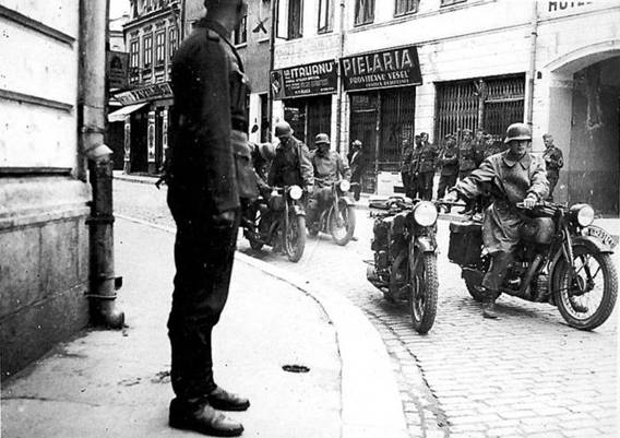 A motorcyclist squad helping each other in a Romanian  (?) city.