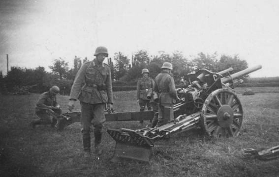One  howitzer le FH 18 being emplaced – France 1940.