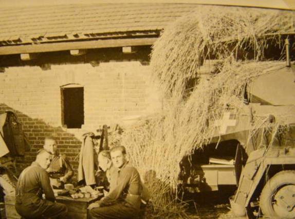 Taking a rest somewhere in Poland – Sep 1939...............in the background a Sd Kfz 232 (6x6) of AA 3.