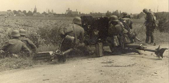An antitank cannon (pak 36 of 37 mm), ready to fire, during the combats - May 28 of 1940.