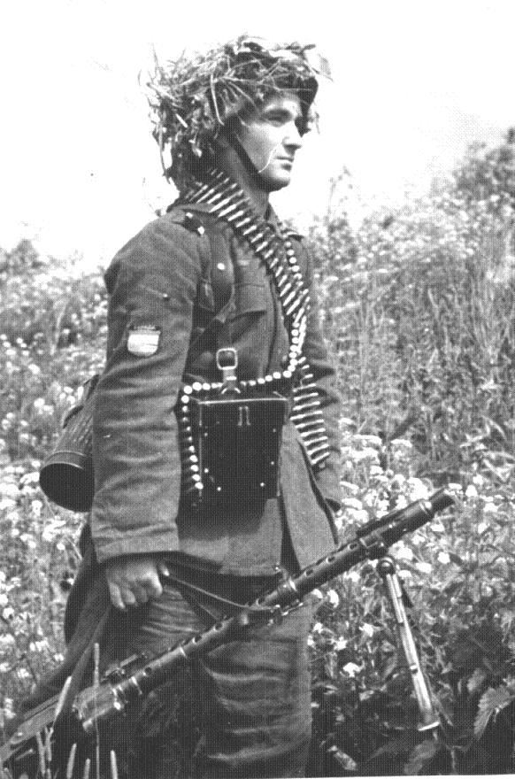 source unknown:spanish volunteer with an mg 34