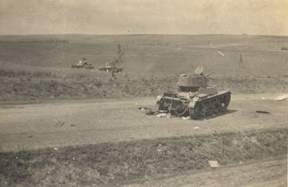 Soviet light tanks T-26 littered the ground.