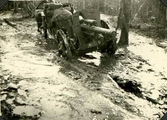 A Le. FH 18 (horse-drawn) marching through the mud - Russia autumn of 1941.