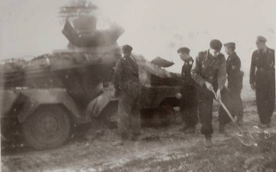 Burying the comrades of the panzerspähwagen Sd Kfz 231.