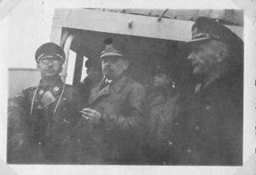 Heinrich Luitpold Himmler, Admiral Rolf Carls (Commander of the Fleet) and Kapitän z. S Karl Dönitz (FdU - Ldr of the Submarine Force) aboard the escort ship Saar.