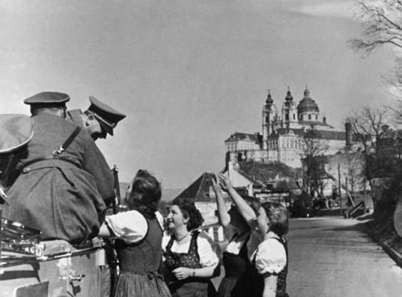 Invasion of Austria: In his march into Austria, Adolf Hitler in Melk on the Danube greeted by young women - March 14 1938.