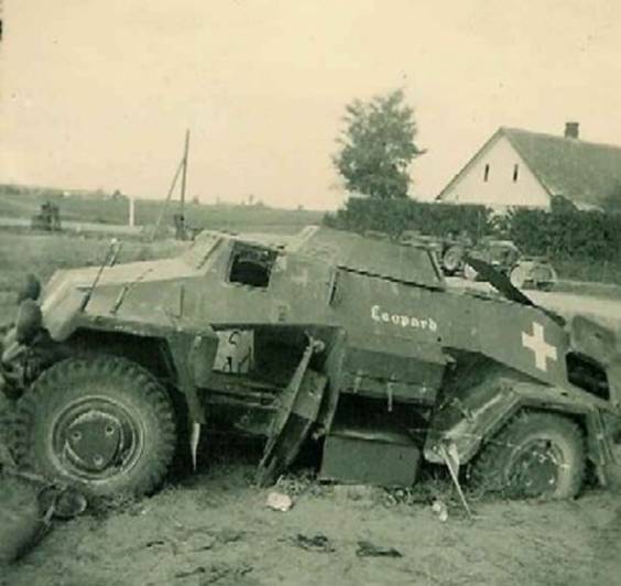A light armored Reconnaissance vehicle Sd Kfz 231 (called Leopard), destroyed by the roadside .......