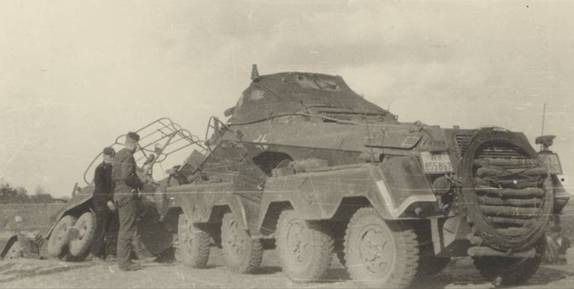 Armored eight wheeler Sd.Kfz.231 (8-Rad) Schwerer Panzerspähwagen takes another armored car Sd.Kfz. 232 (6-Rad) (Fu) in tow............................