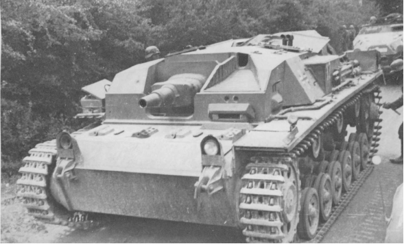 In the foreground a Stug III Ausf A armed with a gun of 75 mm ........