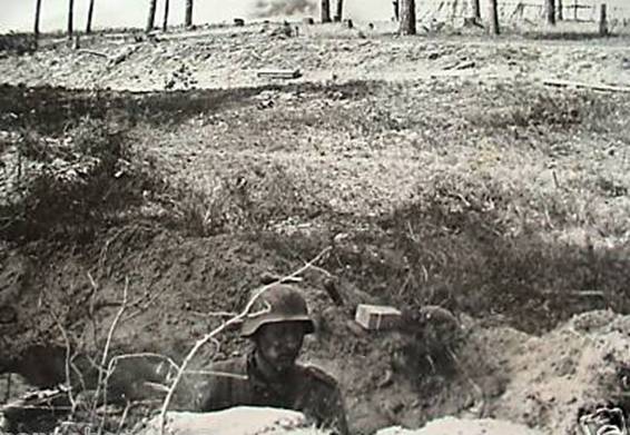 A rifleman in his foxhole around Traby. 25 - 29 June 1941.................................