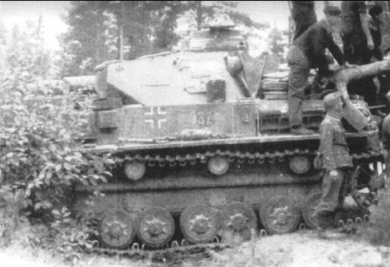 A Pz Kw IV of PR 29 stopped in a wooded ground .............................