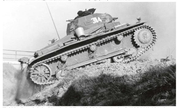 A Pz Kw IIa moving cross-country by soft ground and low hilly terrain .................
