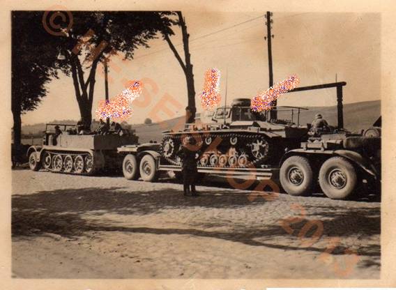PanzerBefehlswagen III - Ausf.D1 with loop antenna-loaded onto flat bed trailer (in this case a Sd. Ah. 116), towed by a Schwerer Zugkraftwagen Sd Kfz 9 18 t.........................