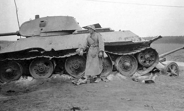 Destroyed T-34/76 (Mod 1940 I guess) of the 15th Tank Regiment of the 8th Tank Division, during the battle to crush the German anti-tank gun PaK-38.........................<br />http://albumwar2.com/t-34-tank-crush-anti-tank-gun-pak-38/