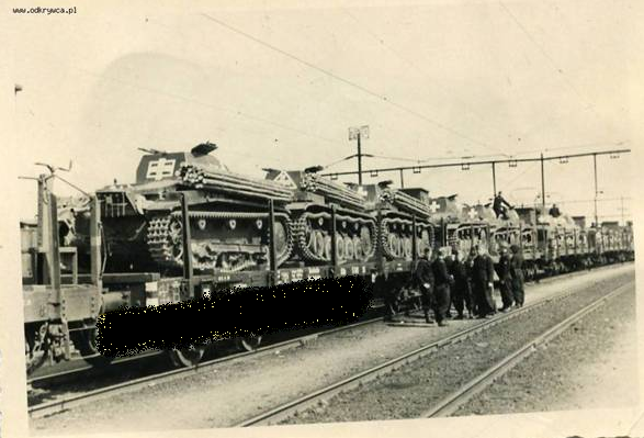 German armored column (light tanks) being transported by rail; in the foreground a Pz Kw II Ausf. a / b (white cross inside rectangle) and Pz Kw II Ausf. A / B / C (white cross in a triangle) ...............