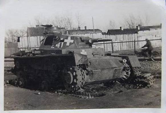 Another view of the Pz Kw III Ausf. C No. 241 (2./ PR 1) disabled by enemy action...........................<br />http://odkrywca.pl/panzer39-wraki-czesc-szosta,700425.html#700425